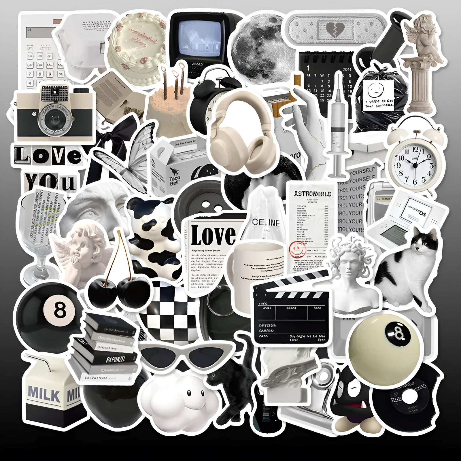 Assortment of black and white vinyl stickers featuring coffee cups and abstract designs for laptops and phones.