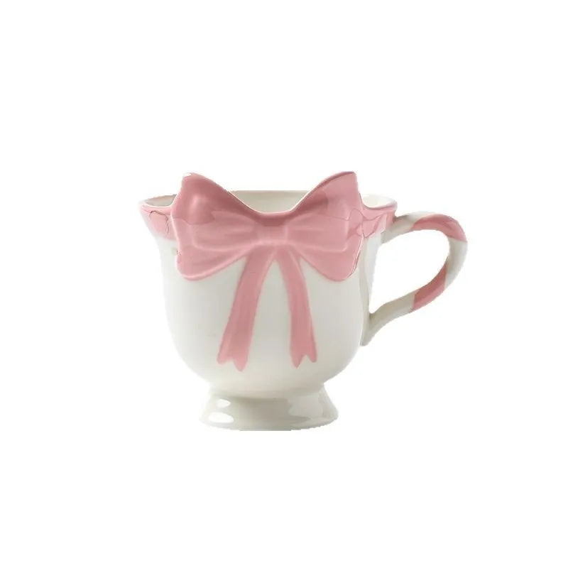 Ceramic mug with heart bow design in black pink colour, 301-400 ml capacity