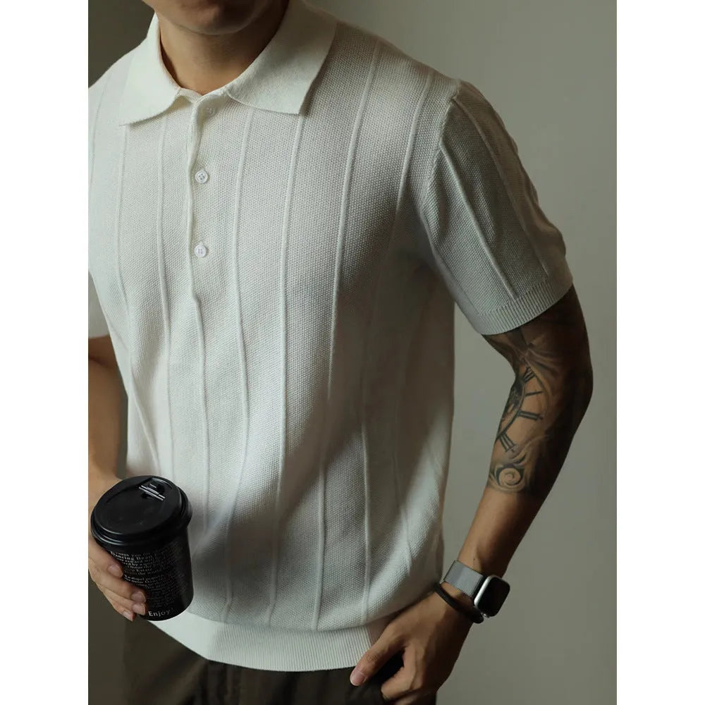 Men's solid black loose fit t-shirt on a hanger