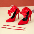 Black and red women's pointed toe court shoes with a strap, shown in 10cm and 12cm heel heights