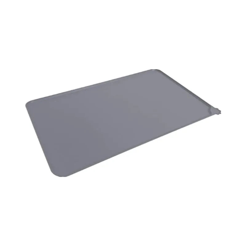 Silicone pet food placemat with non-slip backing in various colours for dogs and cats.