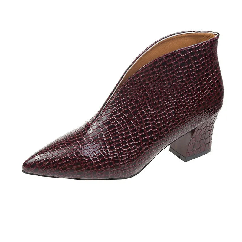 Black women's V-cut pointed ankle boots with an embossed PU upper and a chunky block heel.