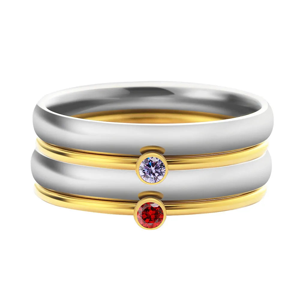 December colour birthstone engraved on a geometric titanium steel ring.