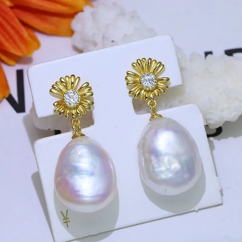 Baroque flower-shaped S925 sterling silver earring frames and a ring holder on a plain background.