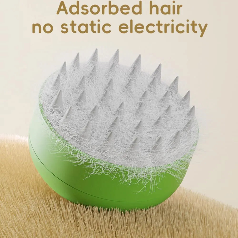 Green and yellow rechargeable cat steam brush with silicone bristles for pet grooming and massage