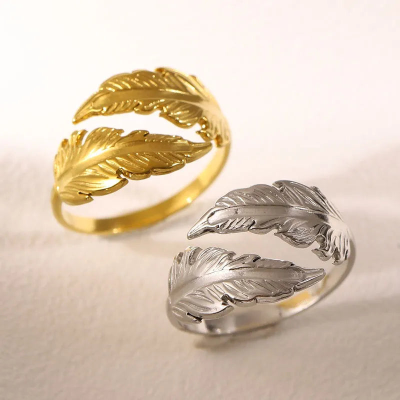 Women's adjustable stainless steel feather ring in gold and silver colour options