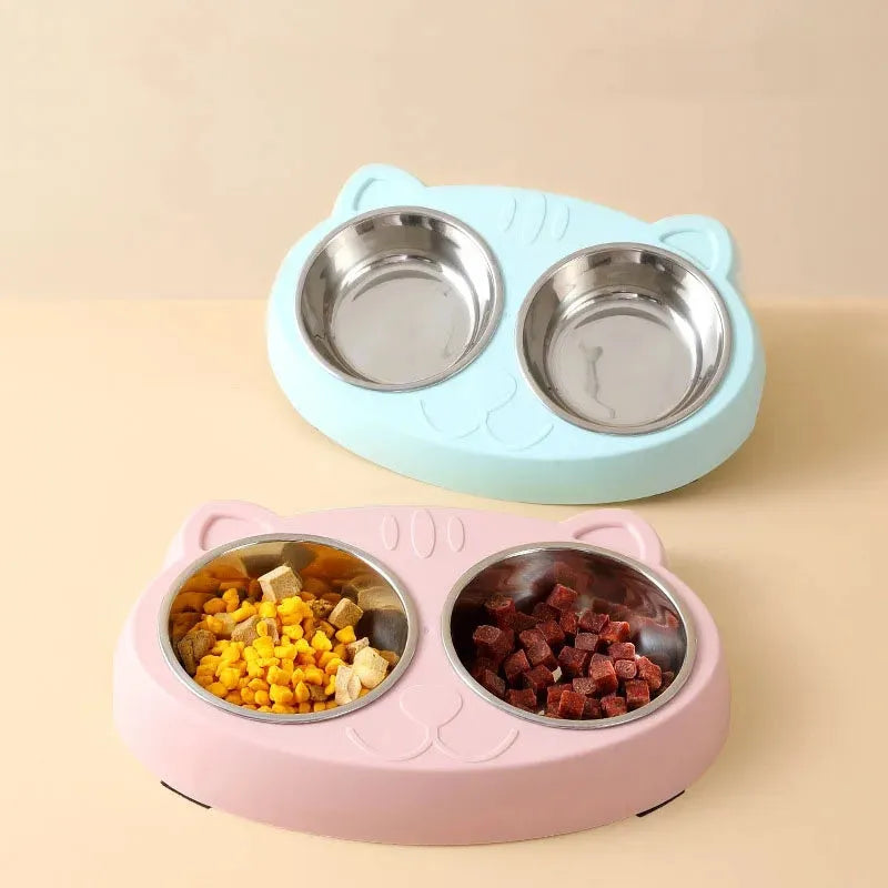 Plastic pet double bowl feeding tray in blue, green, or pink colours measuring 26.5cm long