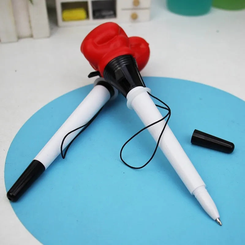 Four stationery boxing press ejection pens with plug-in sleeves and 0.7mm bullet tips
