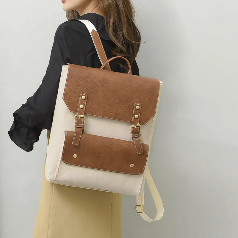 Retro-style soft PU backpack in brown colour, showing front design and straps.