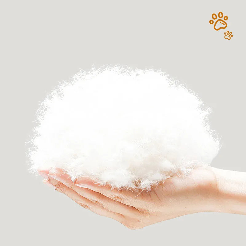 Greyish-white rabbit fur lined pet shell nest bed for cats and small dogs in three sizes.