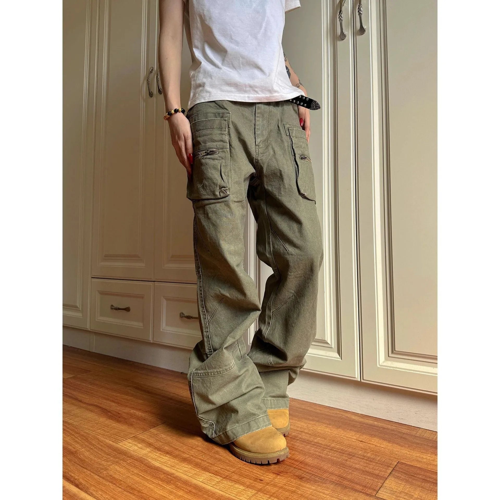 Green and black cotton casual workwear pants with double zipper front closure and multiple pockets
