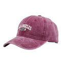 Retro personalised peaked cap with embroidered letters on washed distressed fabric