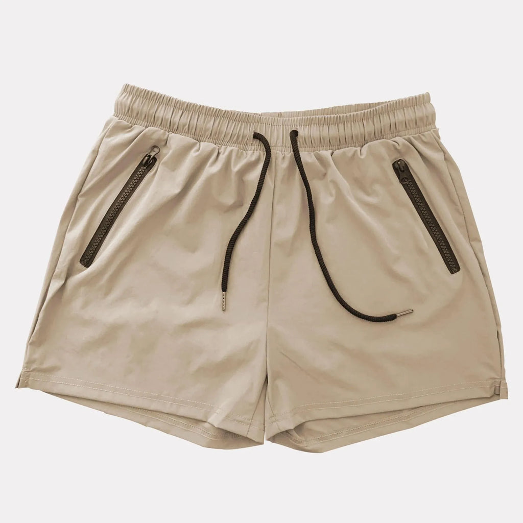Men's blue quick-dry sports shorts on a hanger showing casual mid-waist design