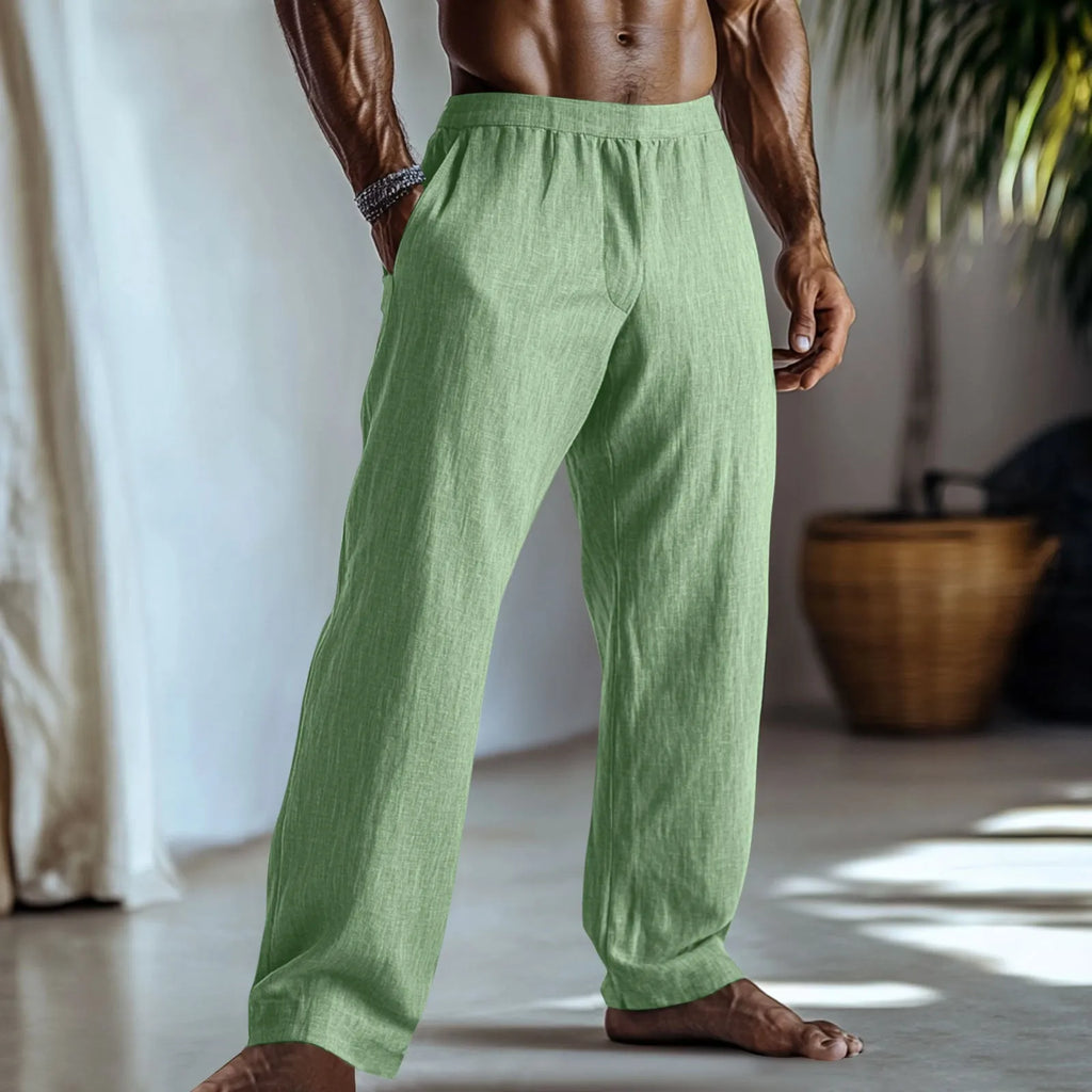 Cotton and linen straight-leg casual trousers in a solid colour with visible pockets.