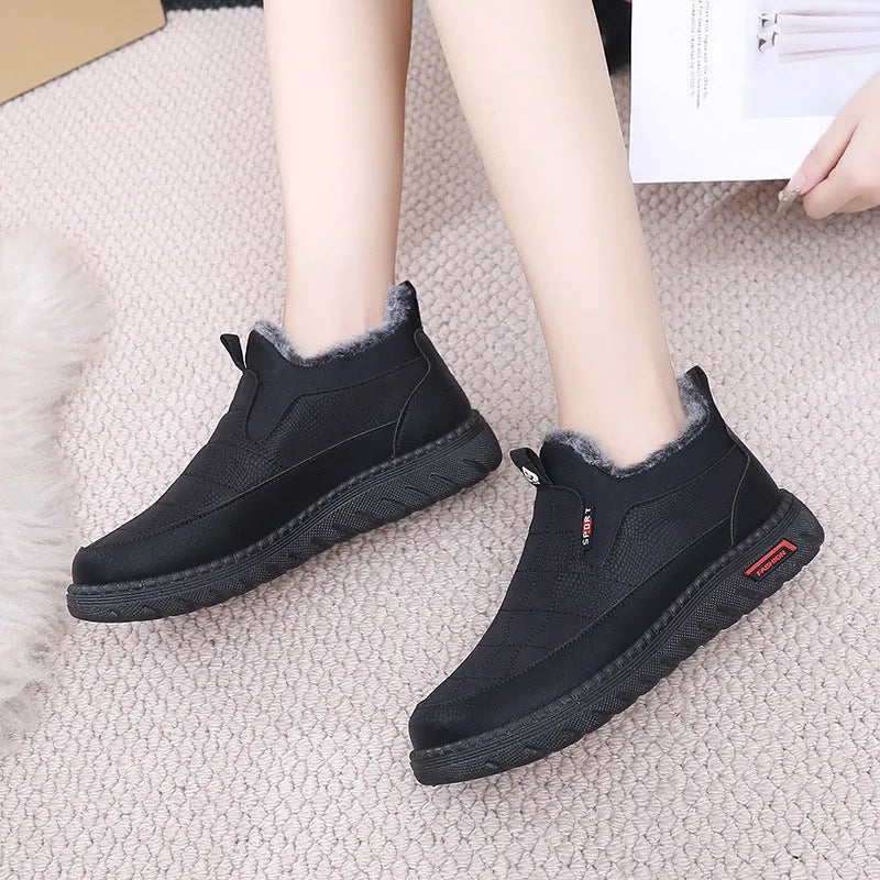 Women's black casual flat boots with round toe and non-slip rubber sole