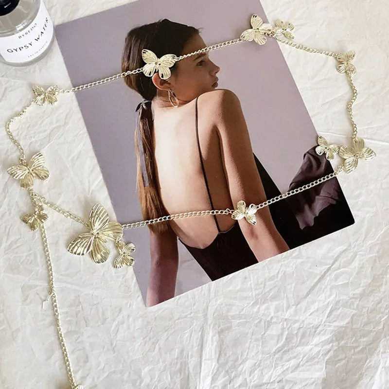 Gold or silver alloy butterfly waist chain measuring 104cm length with 40cm width decorative motif