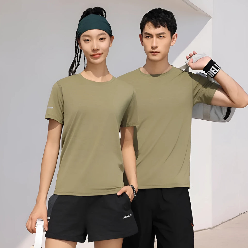 Army green quick-drying waterproof work t-shirt with short sleeves and round neck on a hanger.