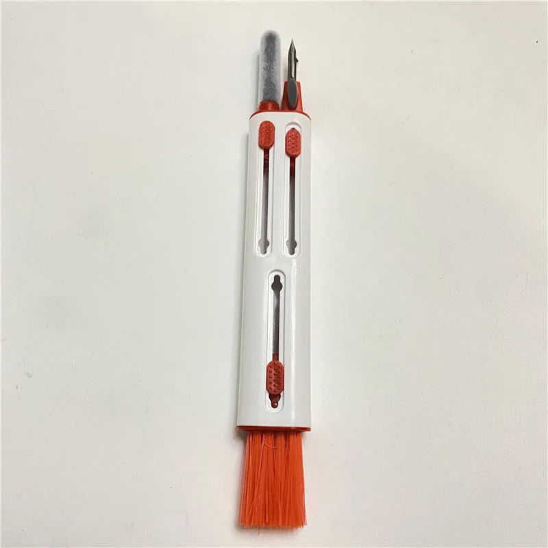 AirPods Pro cleaning kit with white and red 3-in-1 pen, showing brush, sponge, and metal nib heads.
