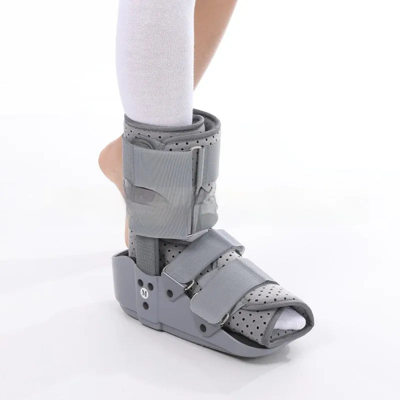 Grey Achilles tendon rehabilitation boot with fixed support design for rupture recovery