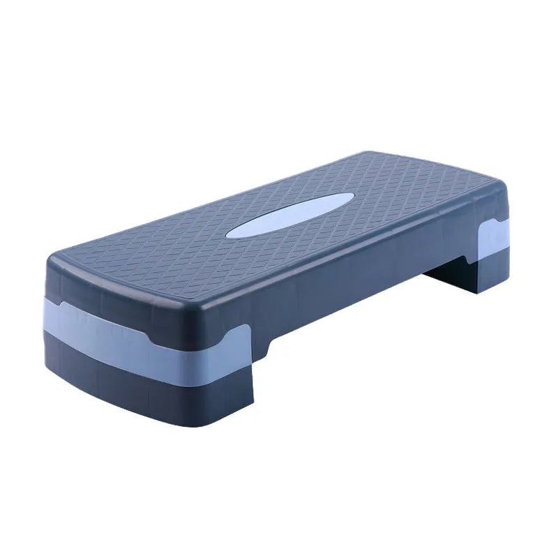 Grey Fit step aerobics platform on a wooden floor