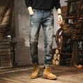 Man wearing vintage blue loose-fit jeans with a drawstring waist, showcasing the fleece-lined interior.
