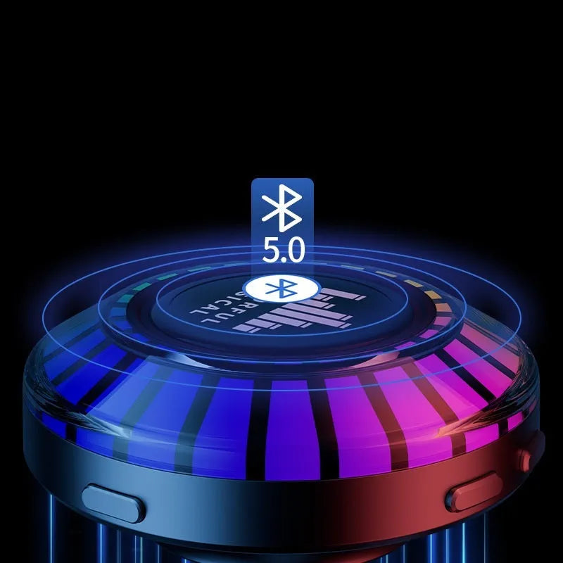 Small black cube voice control polar light Bluetooth LED atmosphere lamp on a table.
