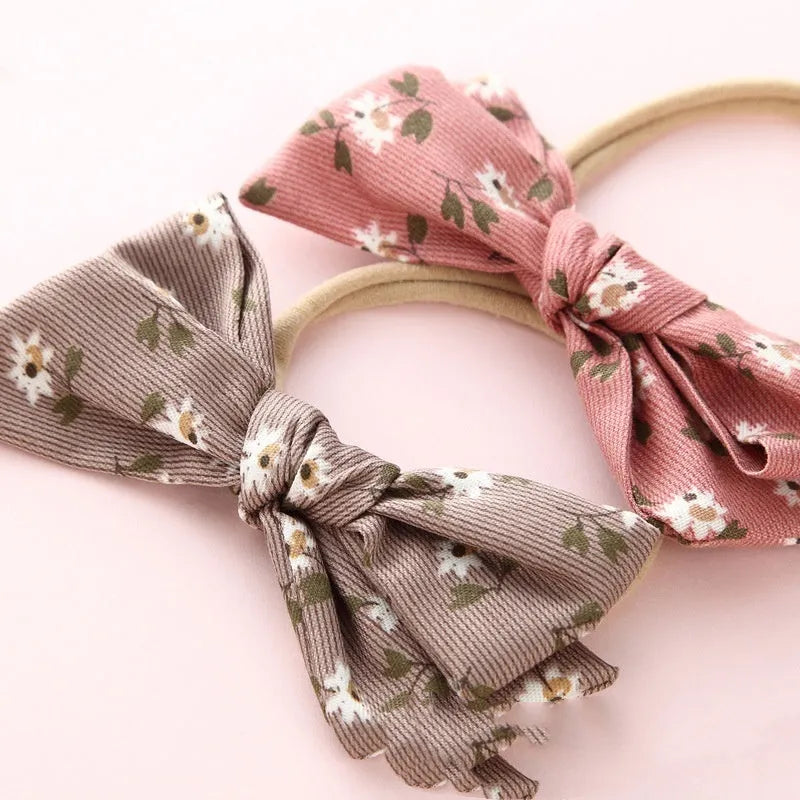 Children's fabric hair band with bow shape and Snow White princess print design