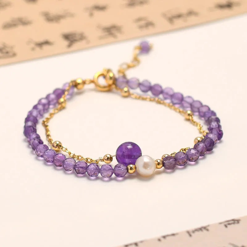 Women's Chinese style crystal bracelet with diamond-shaped pearls and electroplated finish in amethyst colour