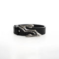 Black men's double-layer cowhide leather belt with a metal letter buckle, laid flat.
