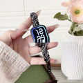 Zinc alloy metal watch strap for iPhone in silver, rose gold, gold, black, and starlight colour options on a grey background.