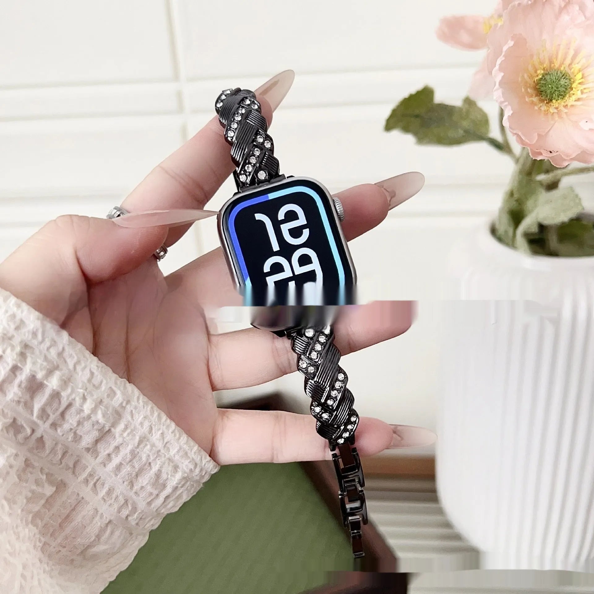 Zinc alloy metal watch strap for iPhone in silver, rose gold, gold, black, and starlight colour options on a grey background.