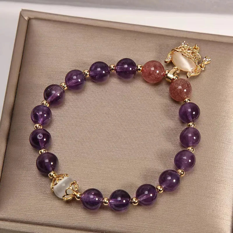 Handmade copper women's bracelet with natural amethyst stone in gold plated longevity lock pendant