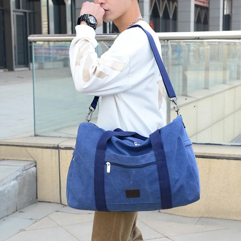 Men's canvas travel duffel bag with three straps in Big Army Green colour
