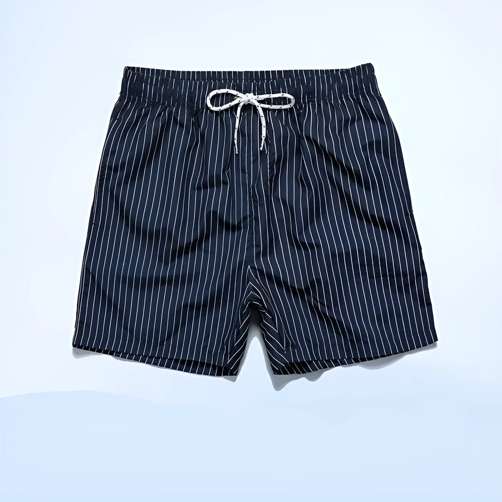 Men's navy blue and grey striped polyester beach shorts with straight leg opening.