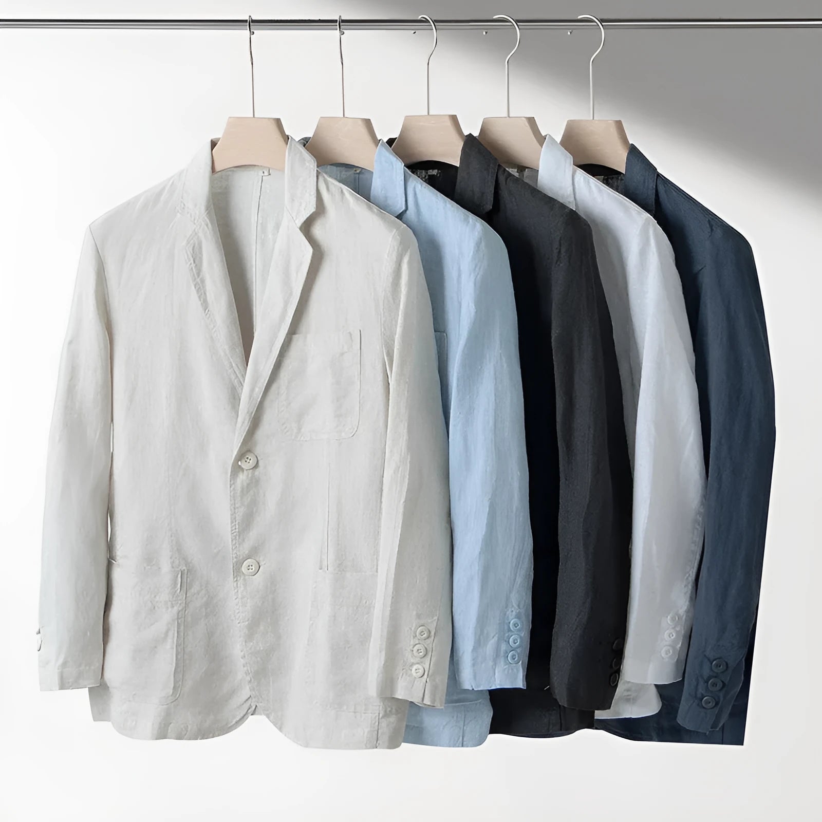 Men's linen suit jacket in loose fit casual style showing solid colour design and long sleeves