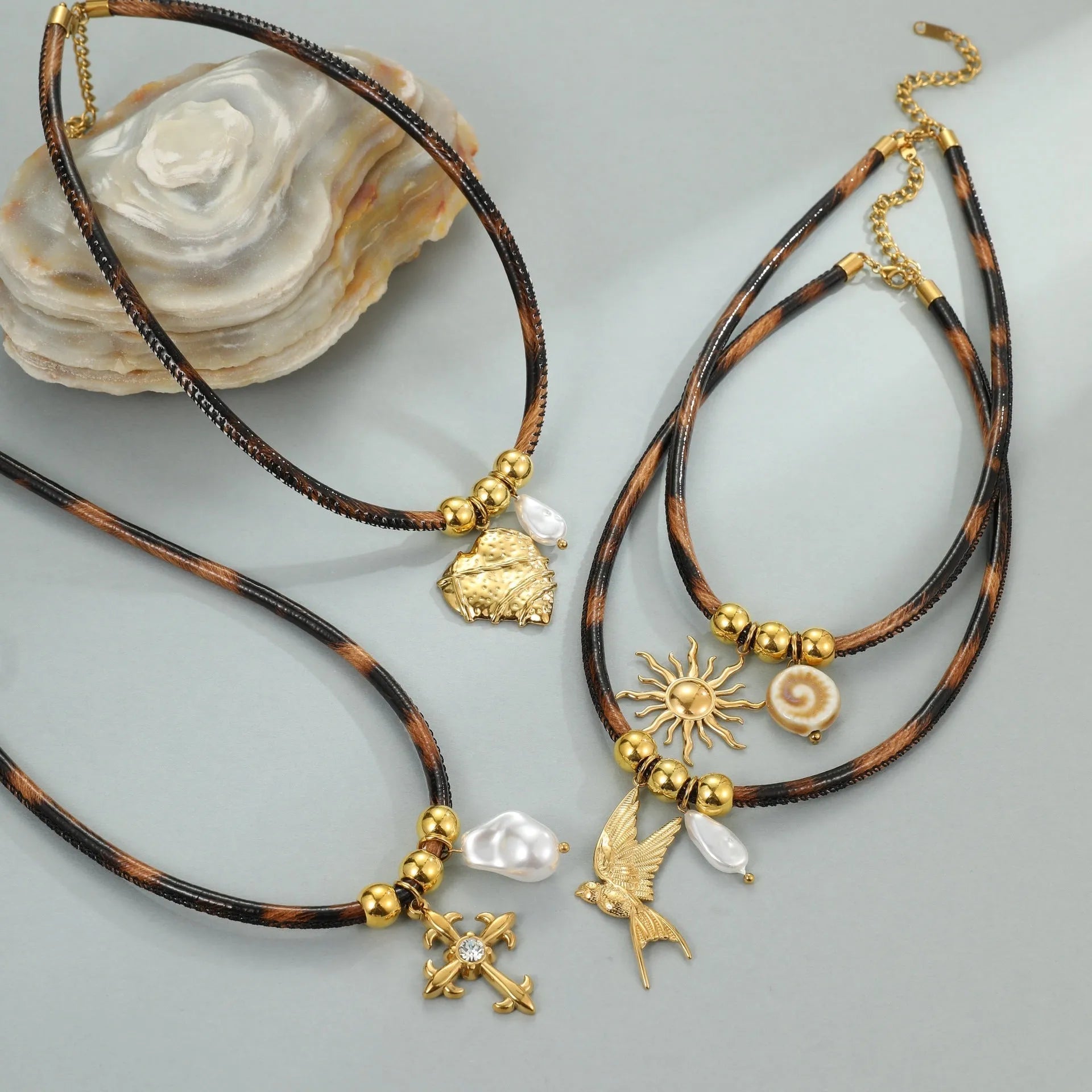 Geometric leopard pendant necklace for women on a stainless steel chain with adjustable length.