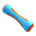 Set of four floating TPR dog toys: a ball, a barbell, and two tires with bumpy textures.