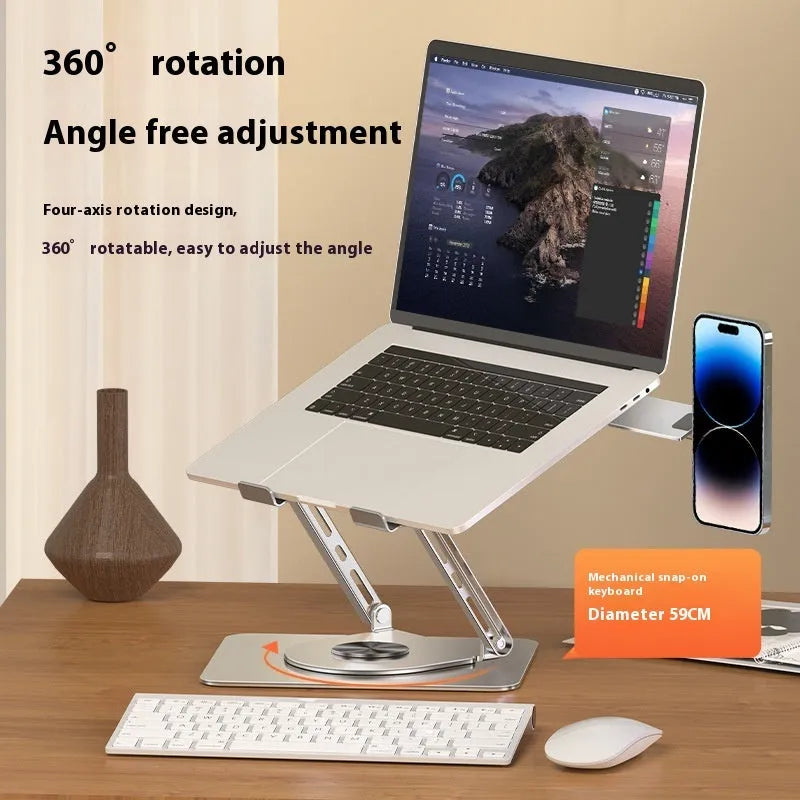Silver carbon steel laptop stand in rotated position with a magnetic phone holder attached to the side.