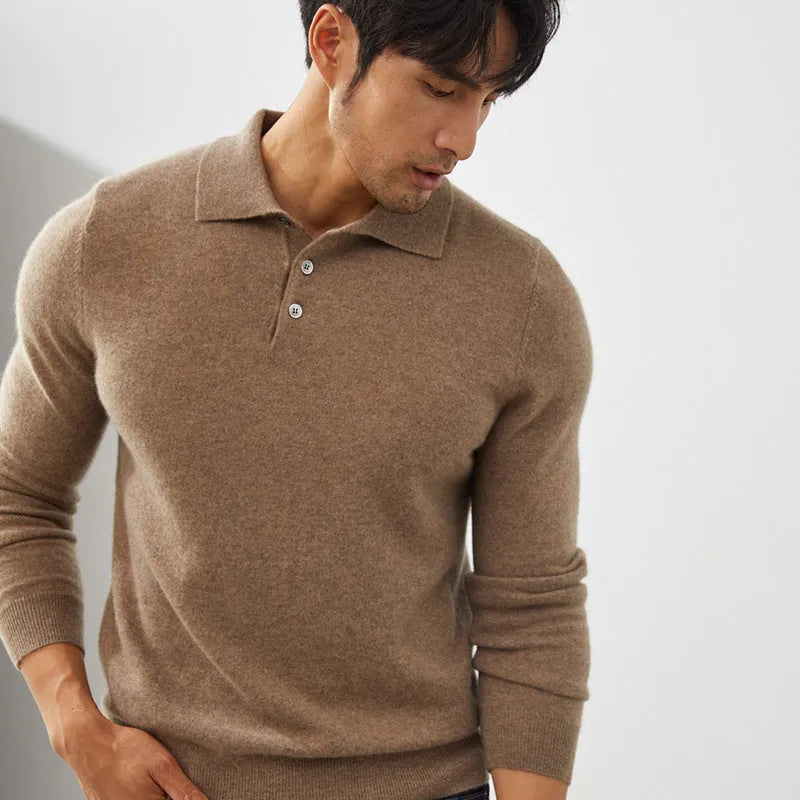 Man wearing a sapphire blue cashmere pullover sweater with a polo collar.