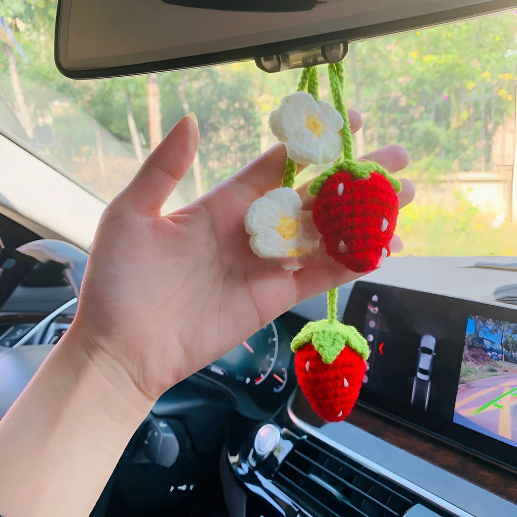 Handmade strawberry-shaped weaving pendant for car decoration made of cotton and hemp.