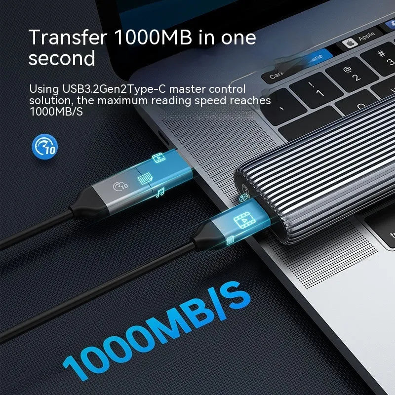 Aluminium external SSD enclosure for M.2 drives with included USB-C cable, heat vest, and thermal paste.