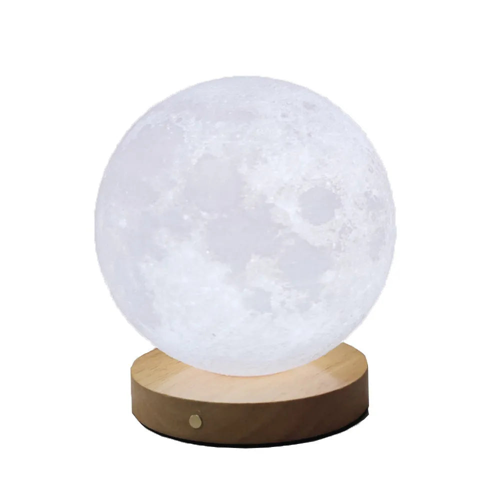 Rotating moon night lamp with wooden base showing wireless control and three colour settings