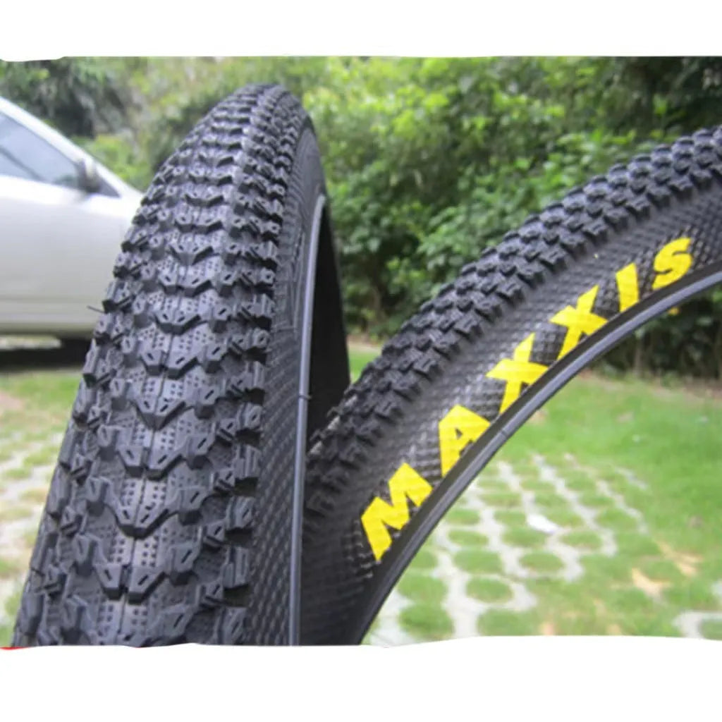 Mountain bike ultralight puncture-resistant tyre showing tread pattern and sidewall with size options