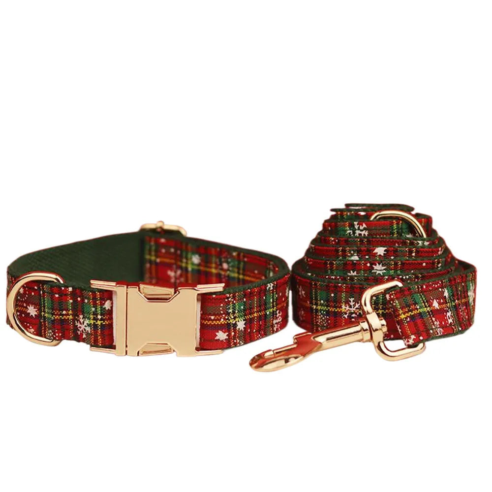 Green snowflake print dog collar set with matching leash, vest, and bow for Christmas