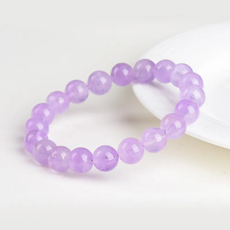 Lavender amethyst bracelet with geometric round beads showing water ripple design in cream body or transparent colour options