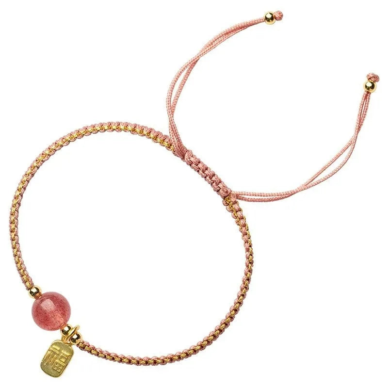 Adjustable red rope bracelet with strawberry quartz transfer beads and sliding knot closure