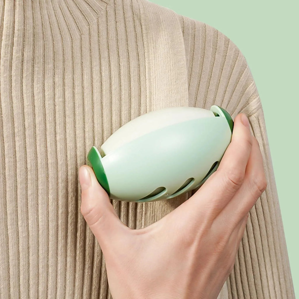 Green washable gel lint roller ball for pet hair removal from clothes and furniture