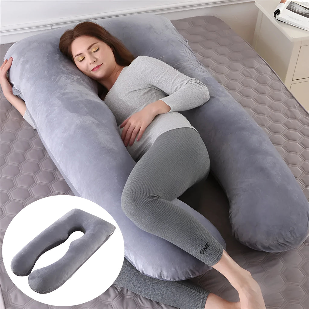U-shaped pregnancy pillow in light blue ice silk fabric on a bed.