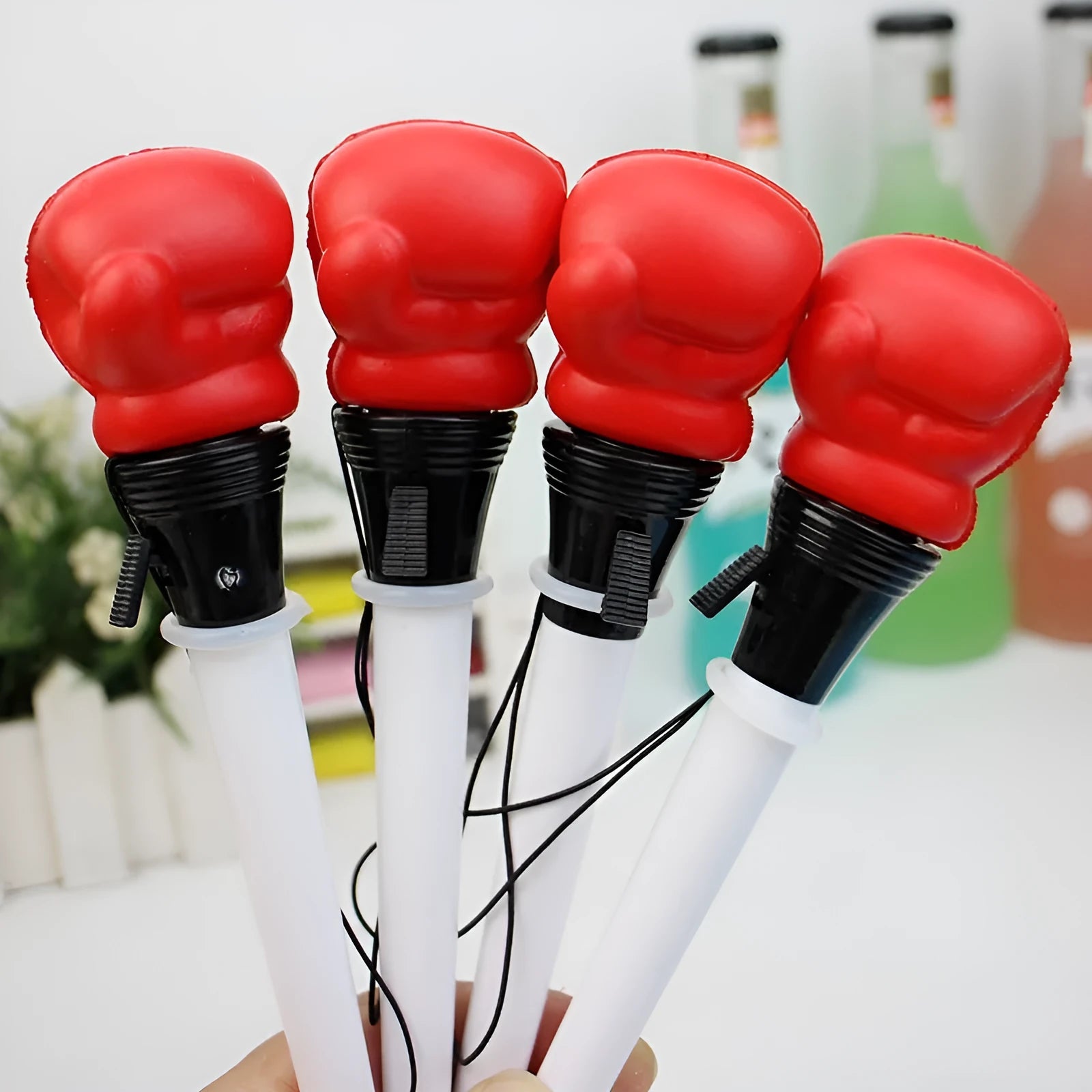 Four stationery boxing press ejection pens with plug-in sleeves and 0.7mm bullet tips