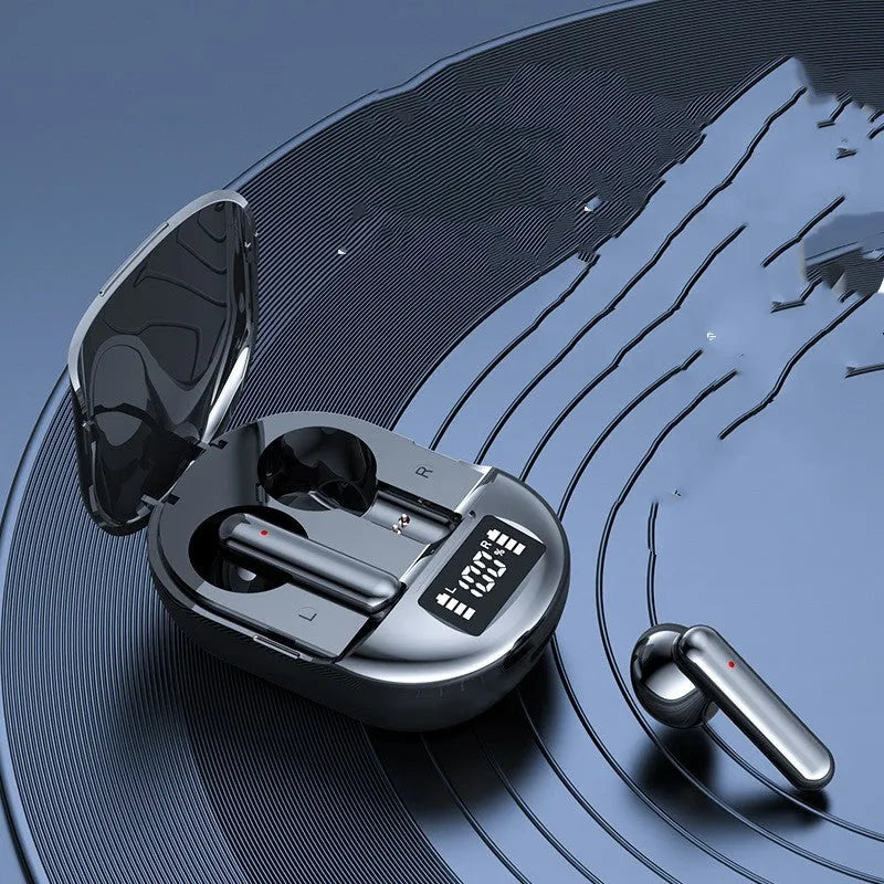 Black and white wireless Bluetooth headset with charging case showing digital display screen